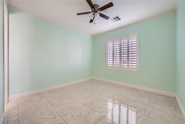 tiled empty room with ornamental molding, a ceiling fan, visible vents, and baseboards