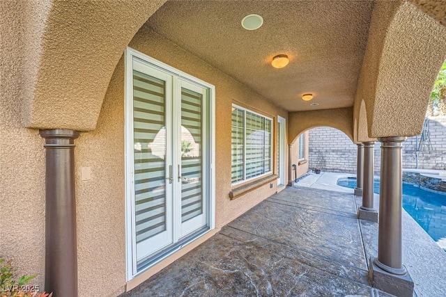 view of patio featuring a fenced in pool