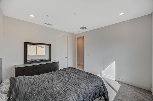 bedroom featuring recessed lighting, visible vents, light carpet, and baseboards