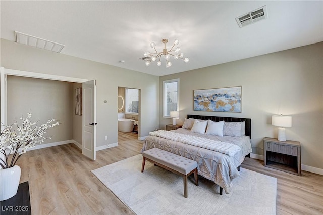 bedroom with light wood-style floors, baseboards, visible vents, and a chandelier