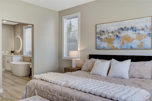 bedroom with light wood-type flooring