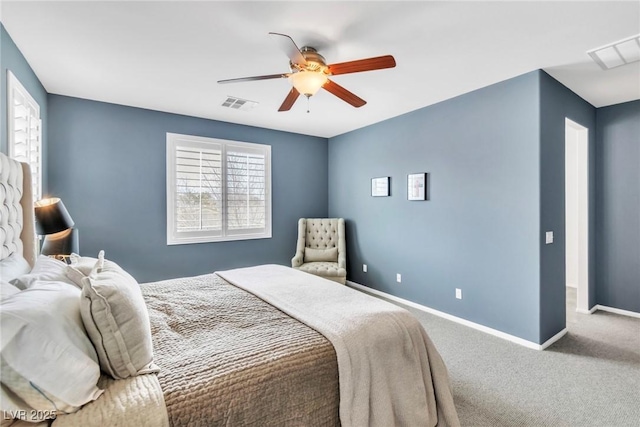 carpeted bedroom featuring a ceiling fan, baseboards, and visible vents