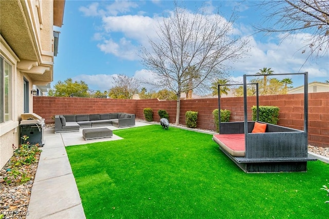 view of yard with an outdoor hangout area, a fenced backyard, and a patio area