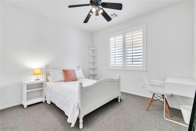 bedroom featuring visible vents, a ceiling fan, baseboards, and carpet floors