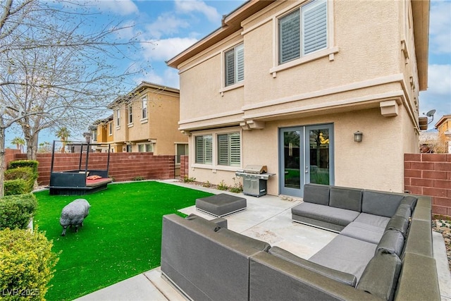 view of patio / terrace with a grill, an outdoor hangout area, and a fenced backyard