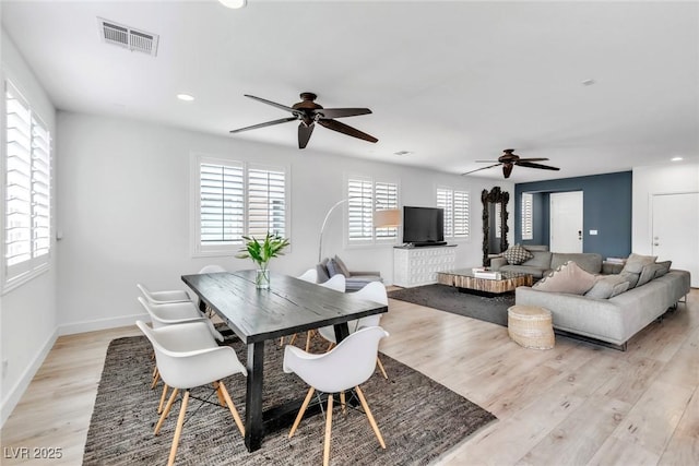 dining room featuring visible vents, baseboards, light wood-style flooring, recessed lighting, and ceiling fan