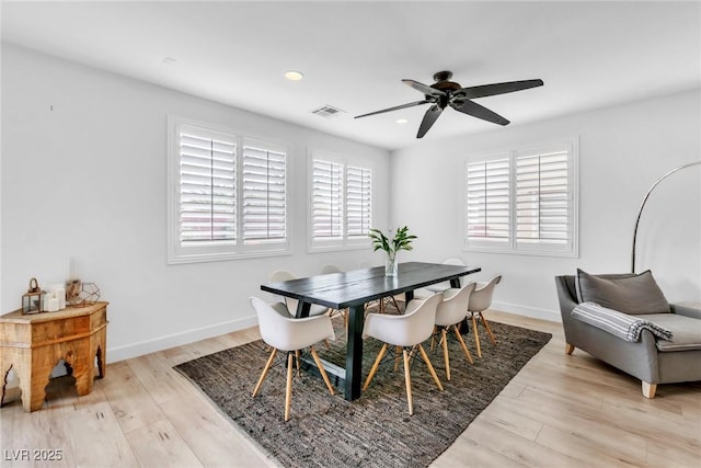 dining space featuring recessed lighting, visible vents, baseboards, and light wood finished floors