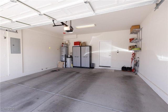 garage with a garage door opener, electric panel, and water heater