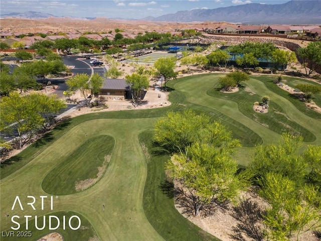 bird's eye view with a mountain view and golf course view