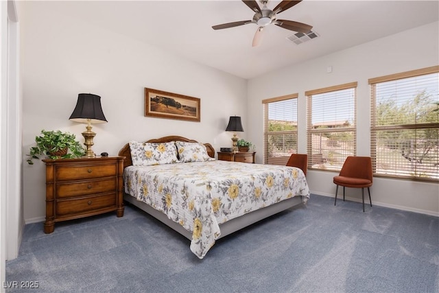 bedroom featuring a ceiling fan, baseboards, visible vents, and carpet flooring