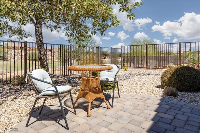 view of patio / terrace with fence