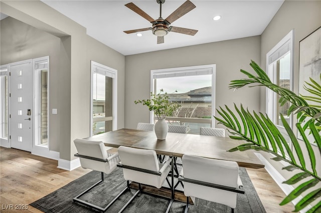 dining area with recessed lighting, baseboards, wood finished floors, and ceiling fan