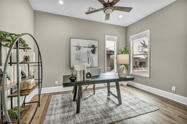 home office featuring visible vents, wood finished floors, recessed lighting, baseboards, and ceiling fan