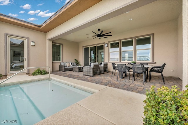 outdoor pool featuring a patio area, outdoor dining space, an outdoor hangout area, and ceiling fan