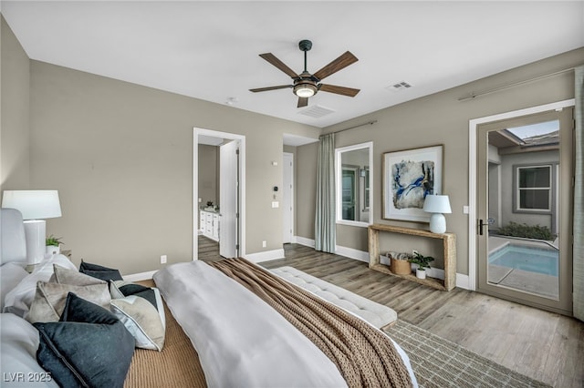 bedroom featuring visible vents, access to outside, wood finished floors, baseboards, and ceiling fan