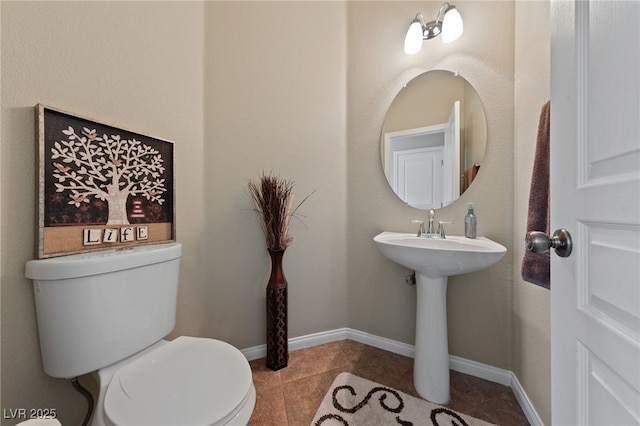 6030 Hidden Summit St, North Las Vegas, NV 89031 - half bath featuring toilet and tile patterned flooring