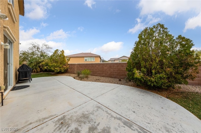 6030 Hidden Summit St, North Las Vegas, NV 89031 - fenced backyard featuring a patio area