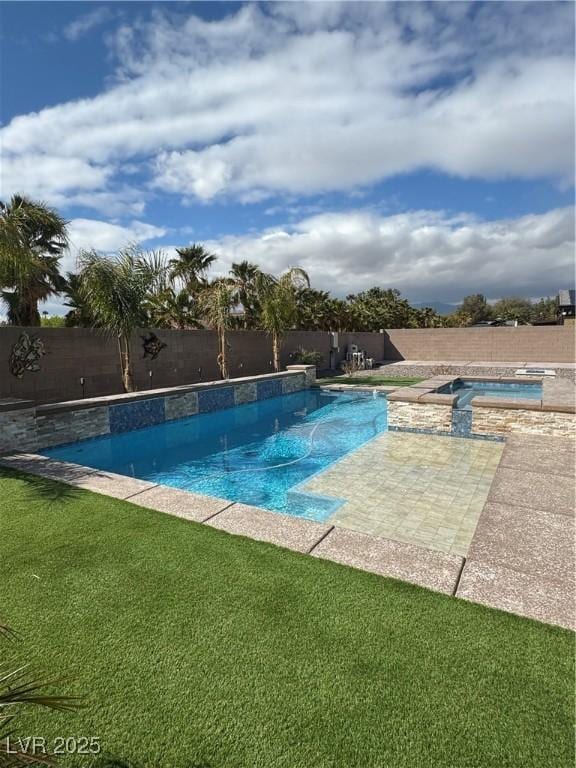 view of swimming pool featuring a fenced in pool, a lawn, a fenced backyard, a patio area, and an in ground hot tub