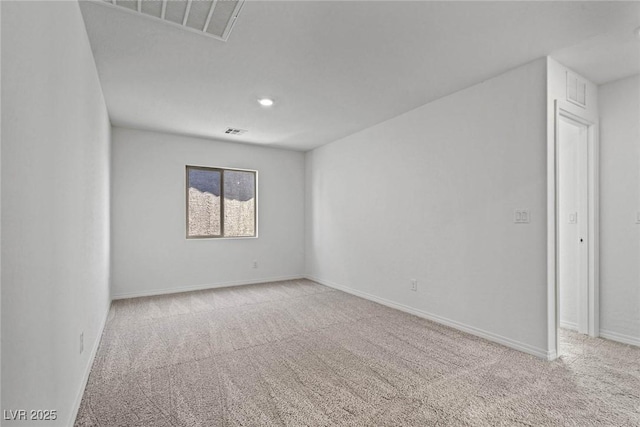 unfurnished room featuring recessed lighting, carpet, visible vents, and baseboards