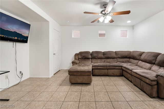 living area featuring recessed lighting, light tile patterned flooring, ceiling fan, and baseboards