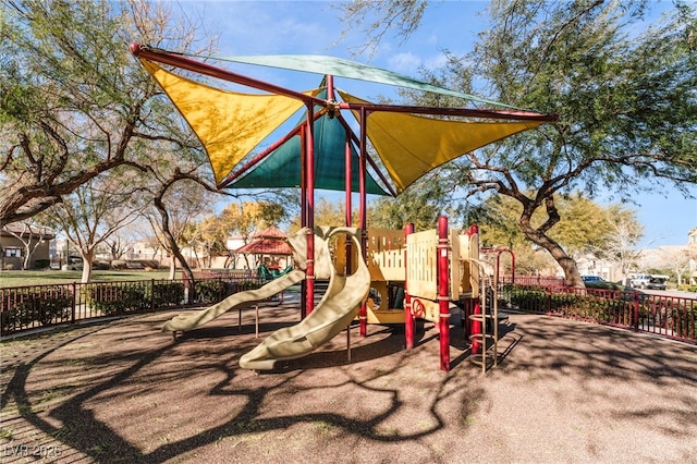 community jungle gym with fence