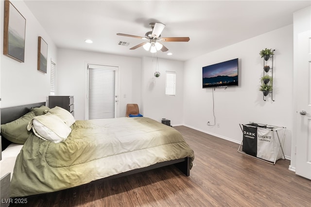 bedroom with dark wood-style floors, baseboards, a ceiling fan, and recessed lighting