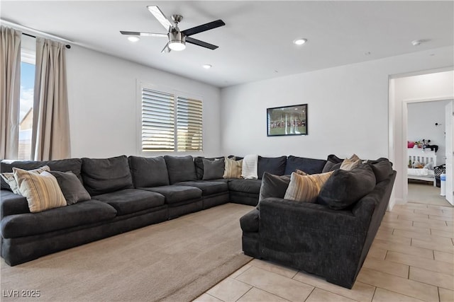 living room featuring light tile patterned floors, a ceiling fan, a wealth of natural light, and recessed lighting