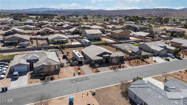 bird's eye view with a residential view and a mountain view