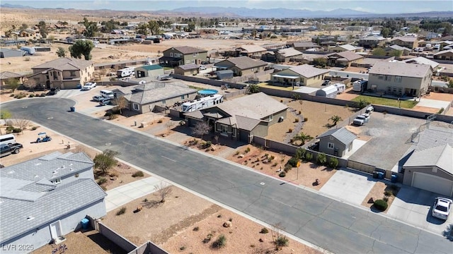 birds eye view of property with a residential view and a mountain view