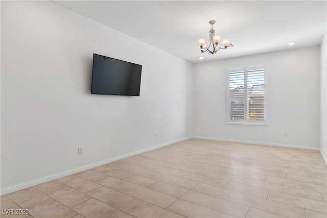 unfurnished room featuring a chandelier, recessed lighting, and baseboards