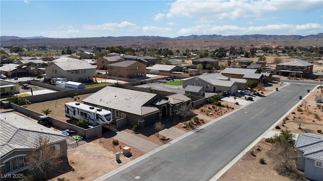 bird's eye view with a residential view and a mountain view