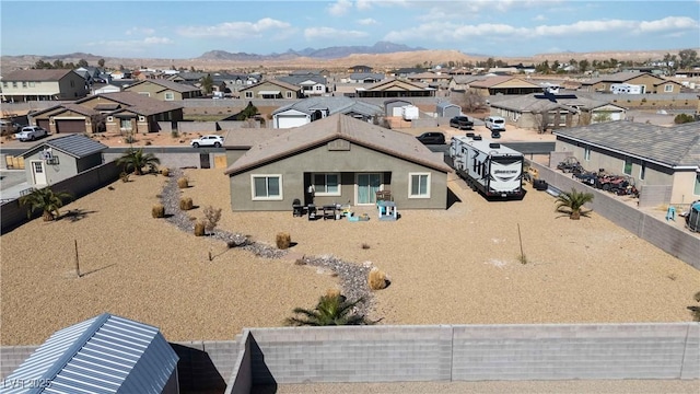 bird's eye view with a residential view and a mountain view