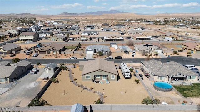 birds eye view of property featuring a residential view and a mountain view