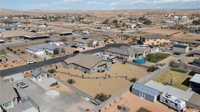 birds eye view of property with a residential view