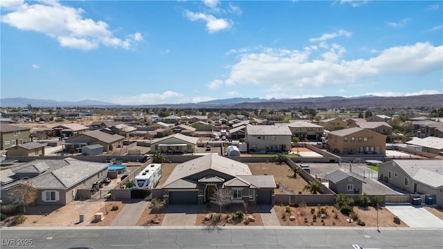 bird's eye view featuring a residential view and a mountain view