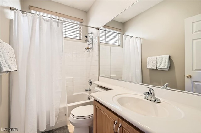 full bathroom with shower / bathtub combination with curtain, vanity, and toilet