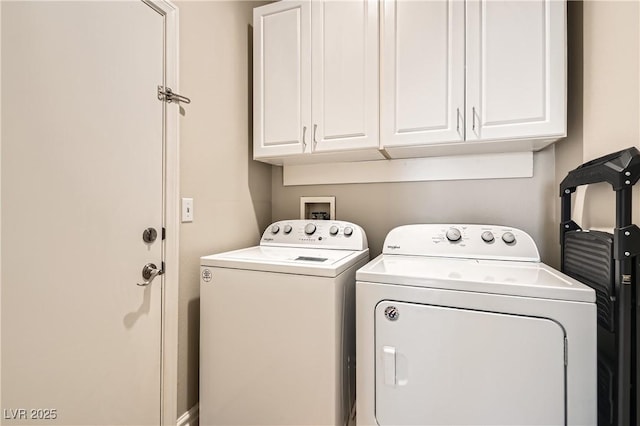 laundry room featuring cabinet space and independent washer and dryer