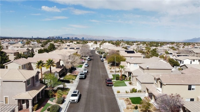 aerial view with a mountain view and a residential view