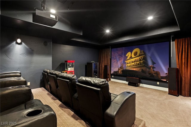 cinema room featuring carpet floors, recessed lighting, a raised ceiling, and baseboards