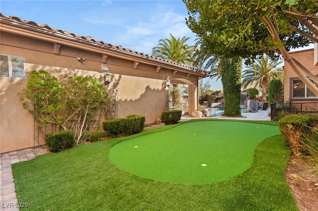 surrounding community featuring a patio area and fence