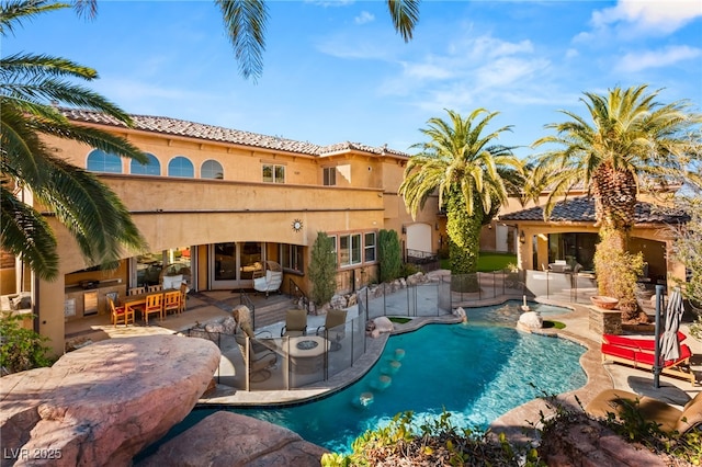 pool featuring a patio area