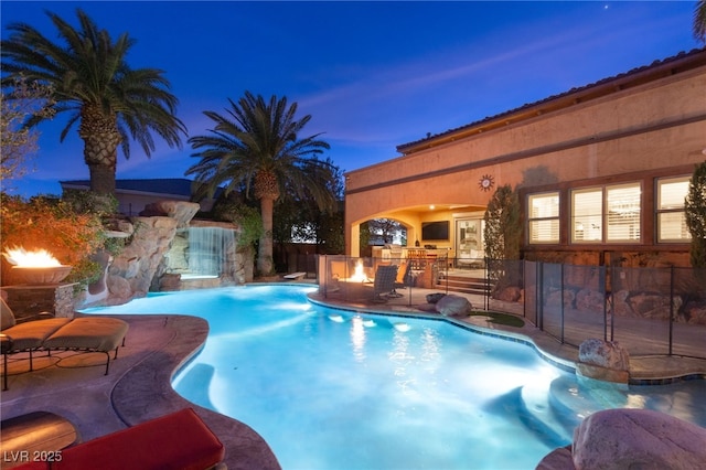 view of pool featuring a patio, fence, and a fenced in pool