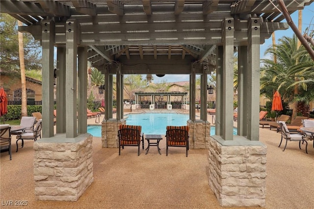 community pool featuring a patio area and a pergola