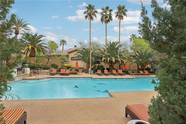 pool with a patio area