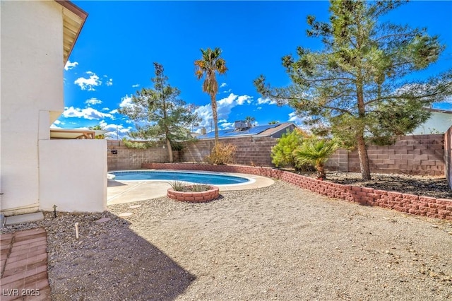 view of swimming pool featuring a patio area, a fenced backyard, and a fenced in pool