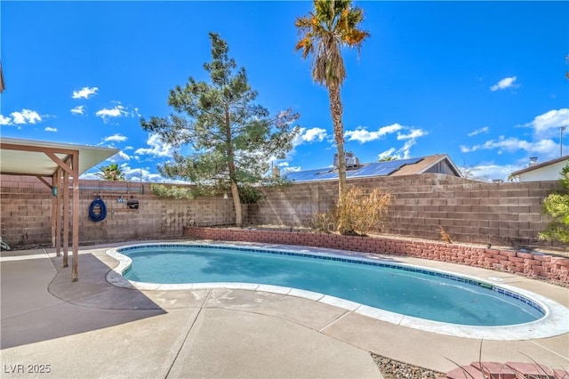 view of swimming pool featuring a fenced in pool, a patio, and a fenced backyard