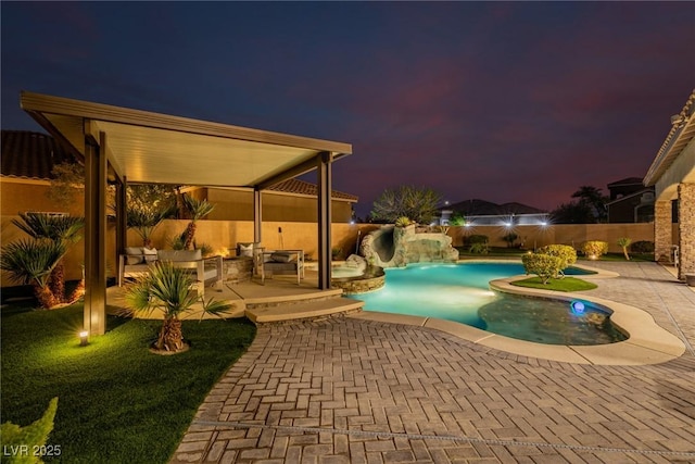 view of pool featuring a patio area, fence, and a fenced in pool