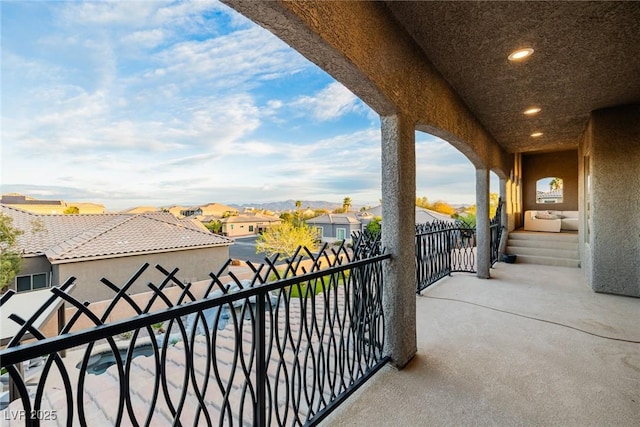 balcony featuring a residential view