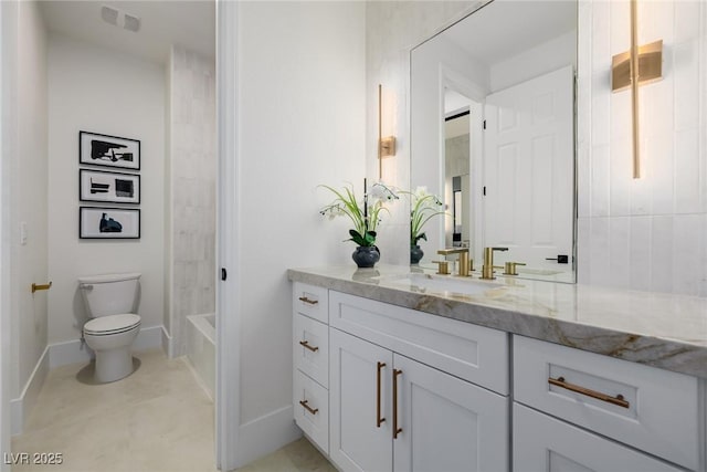 full bathroom with toilet, baseboards, and vanity