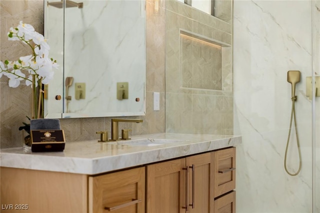 bathroom featuring backsplash and vanity